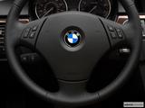  Steering wheel controls close-up. Leveled and from the left photo