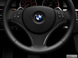  Steering wheel controls close-up. Leveled and from the left photo