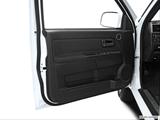  Inside of driver's side open door, window open photo
