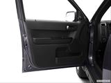  Inside of driver's side open door, window open photo