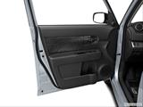  Inside of driver's side open door, window open photo