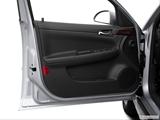  Inside of driver's side open door, window open photo