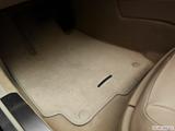  Driver's floor mat and pedals. Mid-seat level from outside looking in photo