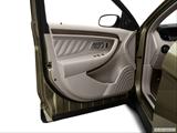 Inside of driver's side open door, window open photo