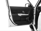  Inside of driver's side open door, window open photo
