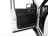  Inside of driver's side open door, window open photo