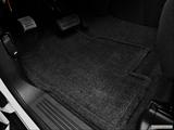  Driver's floor mat and pedals. Mid-seat level from outside looking in photo