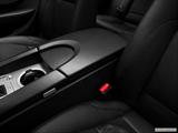  Front center console with closed lid, from driver's side looking down photo