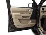  Inside of driver's side open door, window open photo