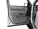  Inside of driver's side open door, window open photo