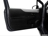  Inside of driver's side open door, window open photo