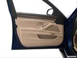  Inside of driver's side open door, window open photo