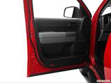  Inside of driver's side open door, window open photo