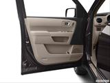  Inside of driver's side open door, window open photo