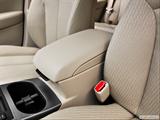  Front center console with closed lid, from driver's side looking down photo