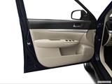  Inside of driver's side open door, window open photo