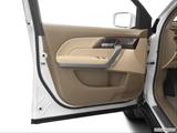  Inside of driver's side open door, window open photo
