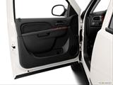  Inside of driver's side open door, window open photo