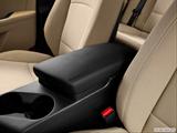  Front center console with closed lid, from driver's side looking down photo