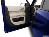  Inside of driver's side open door, window open photo