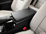  Front center console with closed lid, from driver's side looking down photo