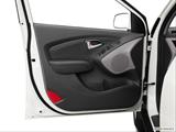  Inside of driver's side open door, window open photo