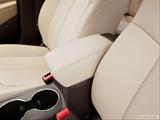  Front center console with closed lid, from driver's side looking down photo