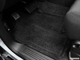  Driver's floor mat and pedals. Mid-seat level from outside looking in photo