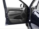  Inside of driver's side open door, window open photo