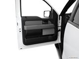  Inside of driver's side open door, window open photo