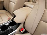  Front center console with closed lid, from driver's side looking down photo