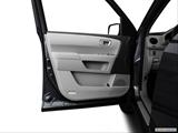  Inside of driver's side open door, window open photo