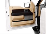  Inside of driver's side open door, window open photo