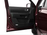  Inside of driver's side open door, window open photo