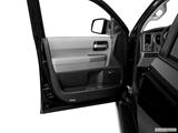  Inside of driver's side open door, window open photo