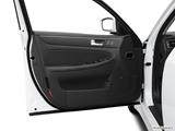  Inside of driver's side open door, window open photo
