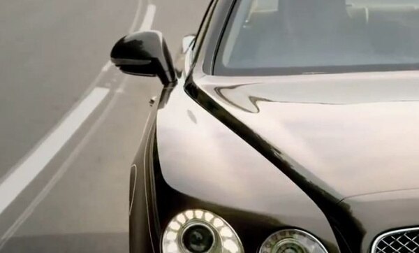 2014-bentles-flying-spur-teaser-front-headlamp-600-001