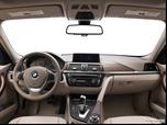 2012 BMW 3 Series Dashboard, center console, gear shifter view photo