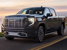 2026 GMC Sierra 1500 front-facing, side angle cropped car colored image
