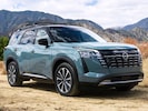 2026 Nissan Pathfinder front-facing, side angle cropped car colored image