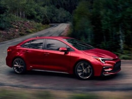 2026 Toyota Corolla Hybrid front-facing, side angle cropped car colored image