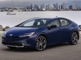 2026 Toyota Prius front-facing, side angle cropped car colored image