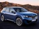 2027 BMW iX3 front-facing, side angle cropped car colored image